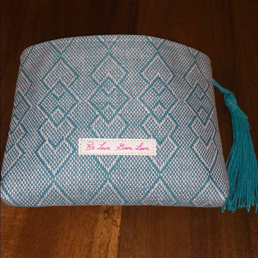 Josie Maran cosmetic bag